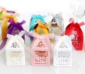 Laser-cut hollow candy gift boxes with ribbon bows for weddings and parties