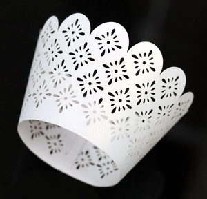 Lace hollow cupcake wrapper with pearl white finish and elegant floral laser cut pattern
