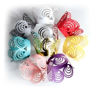 Laser-cut hollow cupcake wrappers in nine assorted pearlescent colors for party decor