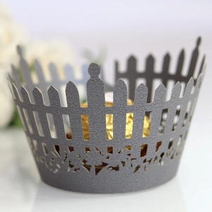 Laser-cut silver fence cupcake liners with floral patterns for wedding cake decoration