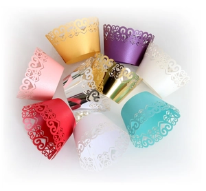 Laser cut heart pattern cupcake wrappers in assorted colors for wedding decorations