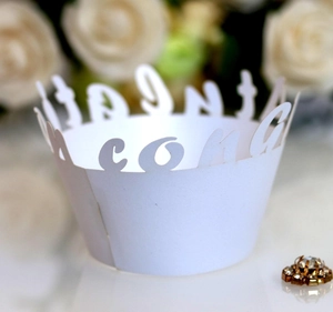 Laser cut white paper cupcake wrapper with elegant hollow congratulations lettering