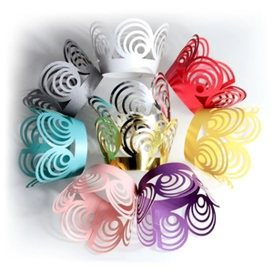 Laser cut lace cupcake wrappers with concentric circle patterns in assorted pearlescent colors