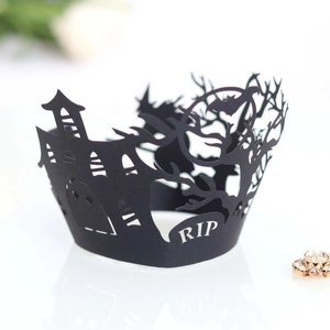 Laser cut black Halloween cupcake wrappers featuring spooky haunted house and bats