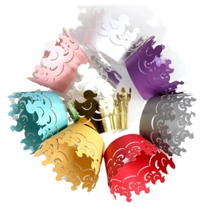 Laser cut golden duck cupcake wrappers in multiple vibrant colors for party decorations