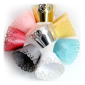 Laser-cut heart and LOVE letter cupcake wrappers in multiple metallic colors for weddings