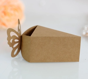 Detail of laser-cut butterfly kraft paper candy box with elegant hollowed-out pattern
