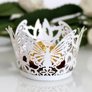 Elegant white butterfly laser-cut lace cupcake wrappers for wedding table decorations