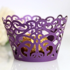 Purple laser cut vine pattern cupcake wrapper with pearl paper finish and gold chocolate