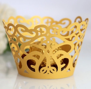 Detailed laser-cut silver-grey cake wrapper with elegant floral lace pattern for weddings