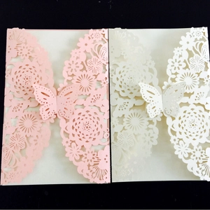 Detail of laser-cut floral patterns and 3D butterfly closure on premium cardstock