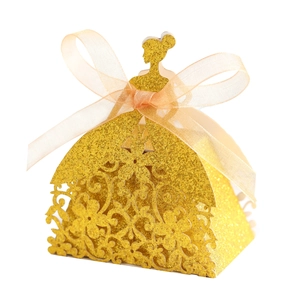 Laser-cut gold glitter paper candy box in elegant princess dress shape with pink ribbon