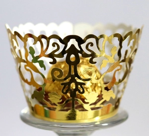 Golden lace cupcake wrappers with elegant European laser-cut filigree vine patterns