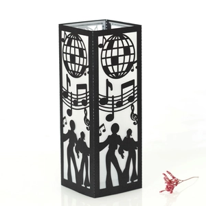 Detail of laser-cut black paper lantern featuring disco dancers and music note silhouettes