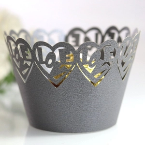 Elegant dark grey pearlescent paper cupcake wrappers with heart-shaped LOVE laser-cut design