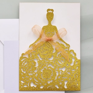 Detail of glitter laser-cut princess gown invitation cover with rose hollow patterns