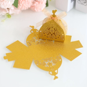 Detailed laser cut gold glitter gift box featuring elegant bride silhouette and ribbon