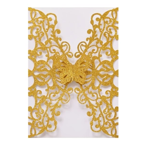 Glittering gold laser-cut butterfly wedding invitation cover with intricate vine patterns