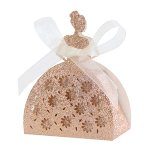 Close-up of laser-cut glitter gift box featuring a girl silhouette and white ribbon