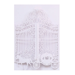 Laser cut white wedding invitation cover with crown and royal carriage design