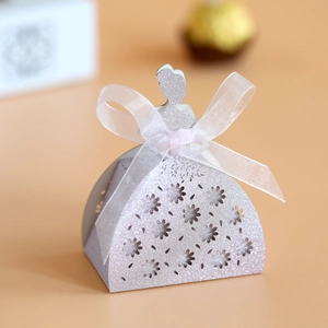 Detail view of laser-cut lace pattern and glitter cardstock on princess favor box