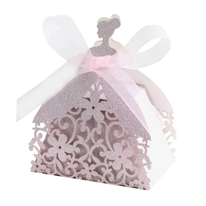 Detailed laser-cut flower patterns on pink glitter princess dress gift box with white bow