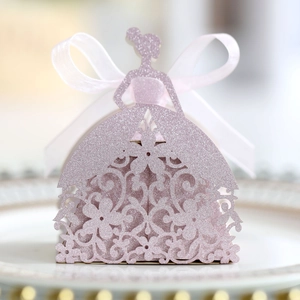 Detail of laser-cut lavender glitter candy box with elegant gown silhouette and pink ribbon