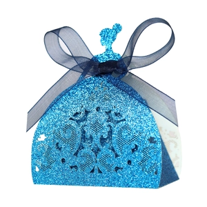 Detail of hollowed navy glitter candy box featuring a royal princess silhouette and blue bow