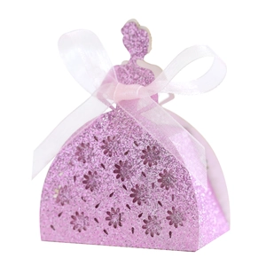 Detail of pink glitter princess dress gift box with flower cut-outs and white organza bow