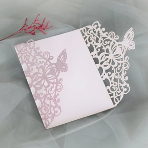 Detailed laser cut pocket invitation with pink glitter butterfly and floral pattern