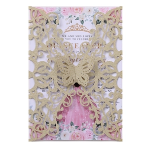 Macro shot of laser-cut butterfly glitter card with elegant pink rose floral pattern