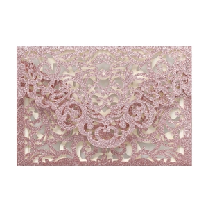 Pink glitter laser-cut wedding invitation card with elegant hollow vine pattern