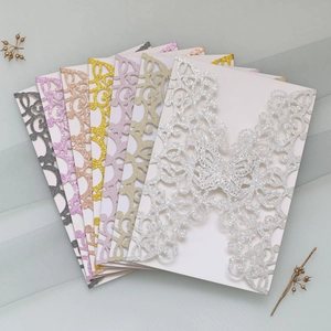 Detailed laser-cut glitter butterfly invitations in silver, gold and rose gold colors