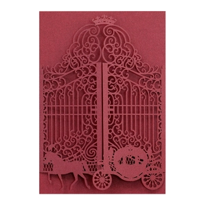 Detail of burgundy laser cut wedding card featuring crown and pumpkin carriage design