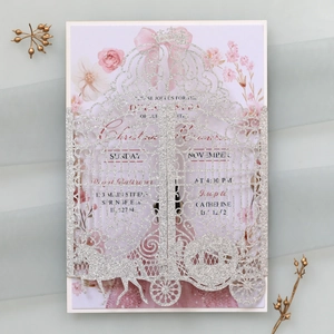 Detailed laser cut silver glitter wedding invitation with floral insert card
