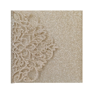 Detailed laser-cut European wedding invitation cover with gold glitter texture