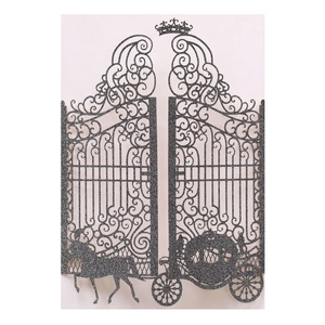 Detail of laser-cut black glitter invitation featuring a carriage and royal gate