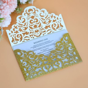 Elegant laser cut wedding invitation with white hollow sleeve and gold glitter insert card
