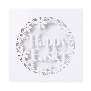 Detail of laser-cut Happy Easter invitation card with intricate daisy floral patterns