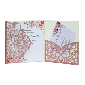 Laser-cut rose gold glitter wedding invitation set with floral inner card and RSVP card