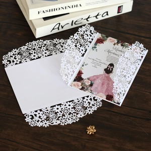 Detailed laser-cut butterfly invitation shell with floral XV Años inner card set