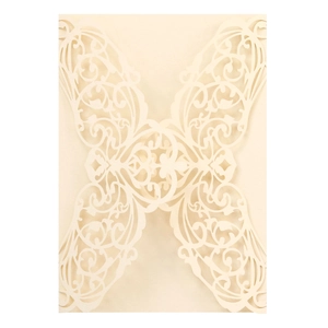 Laser cut invitation cover in beige paper with elegant镂空 art filigree pattern