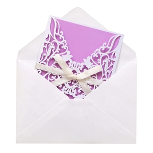 Laser cut butterfly wedding invitation set with purple cardstock and white silk ribbon