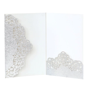 Detail of silver glitter invitation card with laser-cut hollow lace and inner pocket