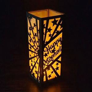 Laser cut Happy Retirement decorative paper lantern with starry pattern and warm LED light