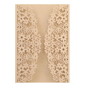 Laser cut butterfly and floral hollow champagne gold wedding invitation covers on white