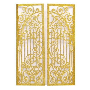 Macro detail of laser-cut glitter gold paper with elegant floral patterns for wedding invites
