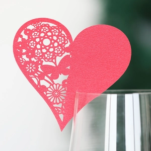 Red laser-cut heart wine glass place cards with pearl finish for wedding table decor
