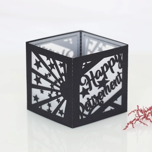 Detailed laser-cut Happy Retirement paper lantern with elegant star patterns and black finish
