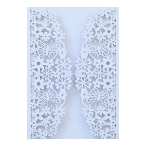 White laser-cut wedding invitation sleeve with pearl paper and butterfly floral patterns